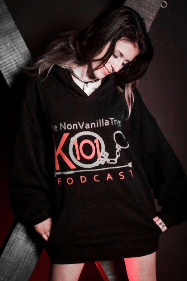 photographer NonVanillaTryst Studios glamour modelling photo. candid moment with emily rose in our podcast sweatshirt while im getting lighting ready for a shoot  linktreemrnvt.