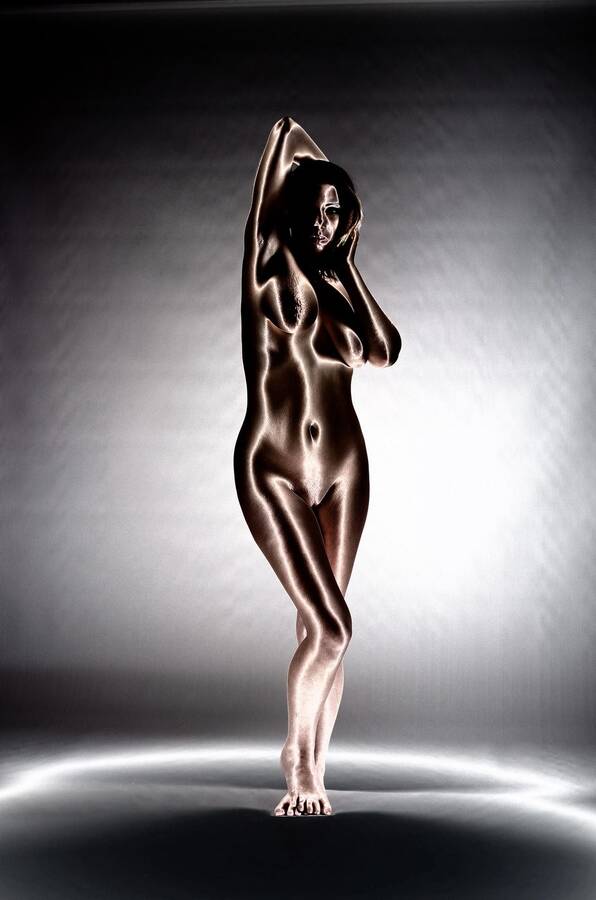 photographer Dennis Bloodnok art nude modelling photo with Not on AdultFolio. the amazing april k not on adultfolio posing in darkness and in solarisation.