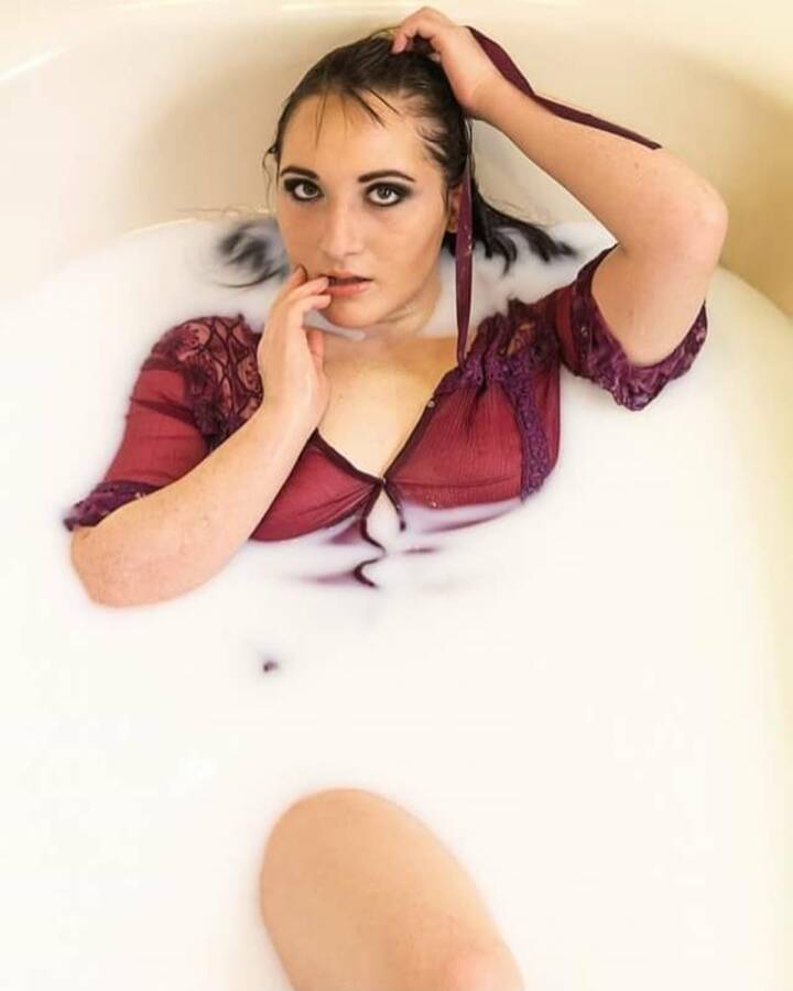 model Naughty Nikii milk bath modelling photo taken by The_Seraglio